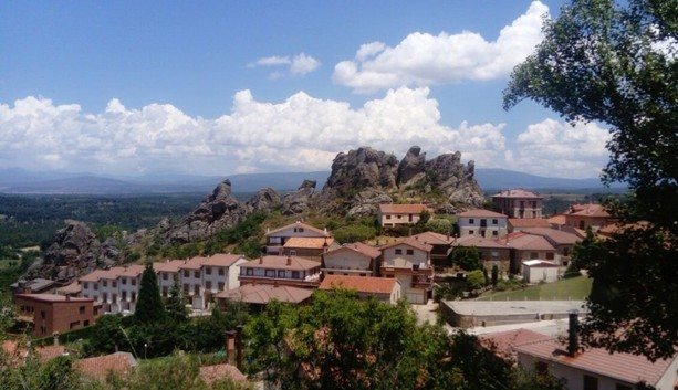 A stone town beneath the rock